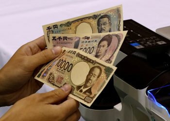 Japanese yen surges after BOJ hints at policy shift
