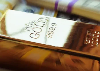 Gold Set to Decline for Second Consecutive Week Amid Strong US Economy and Dollar