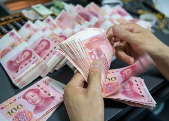 China at a Crossroads with Yuan Depreciation: Implications for Domestic and Global Economy